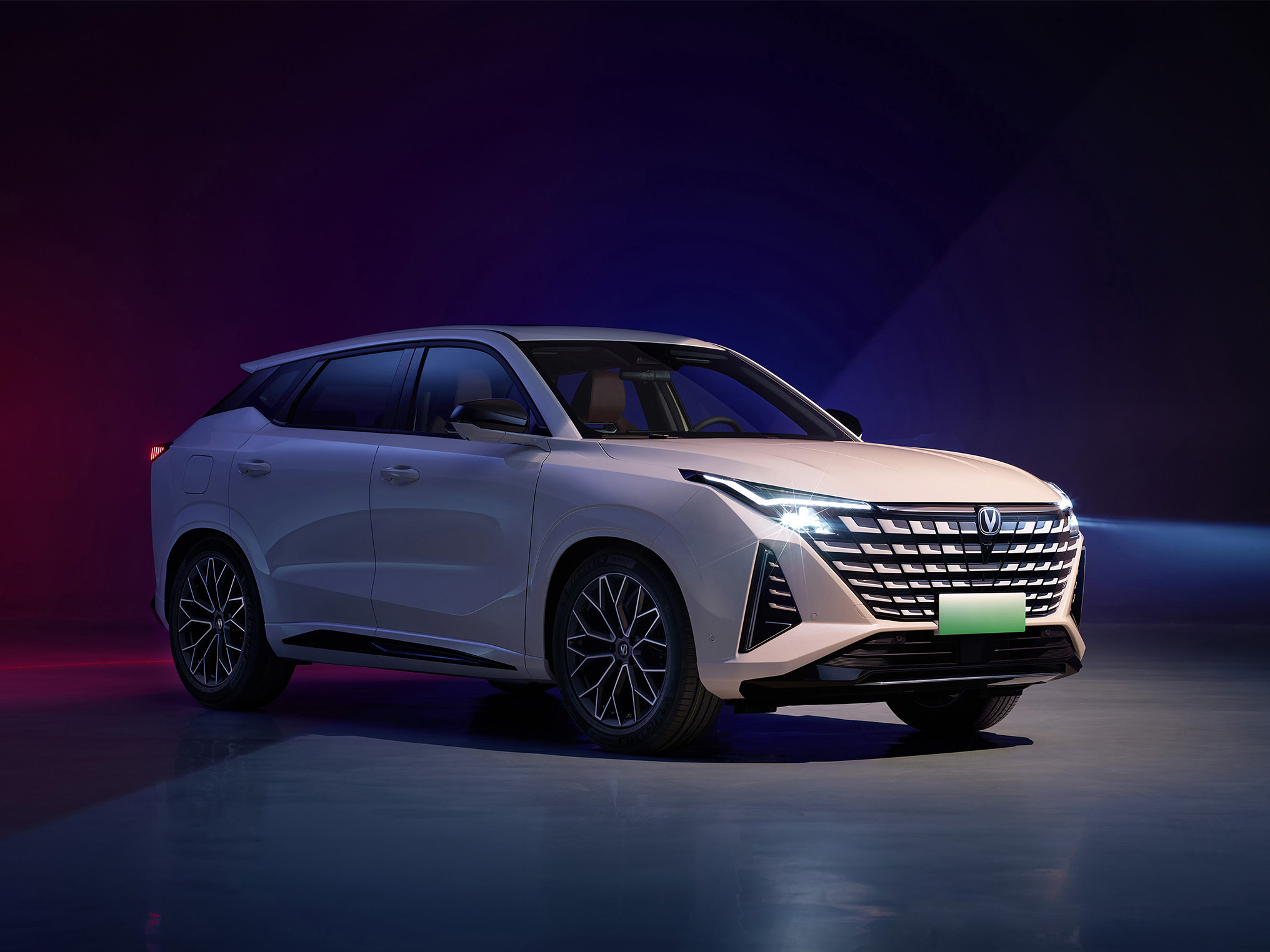 White Changan UNI-Z SUV in a dark studio, front three-quarter view